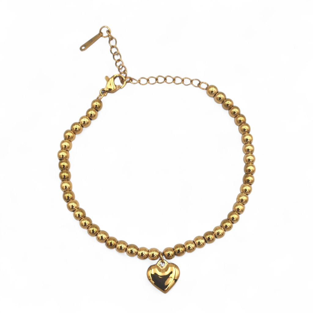 gold beaded bracelet with heart charm gold beaded bracelet with heart charm