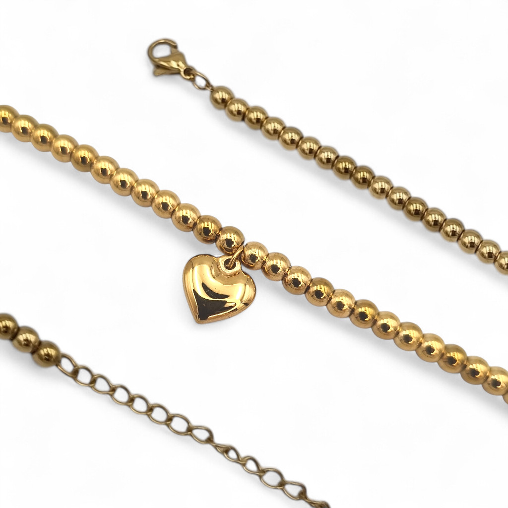 gold beaded bracelet with heart charm gold beaded bracelet with heart charm