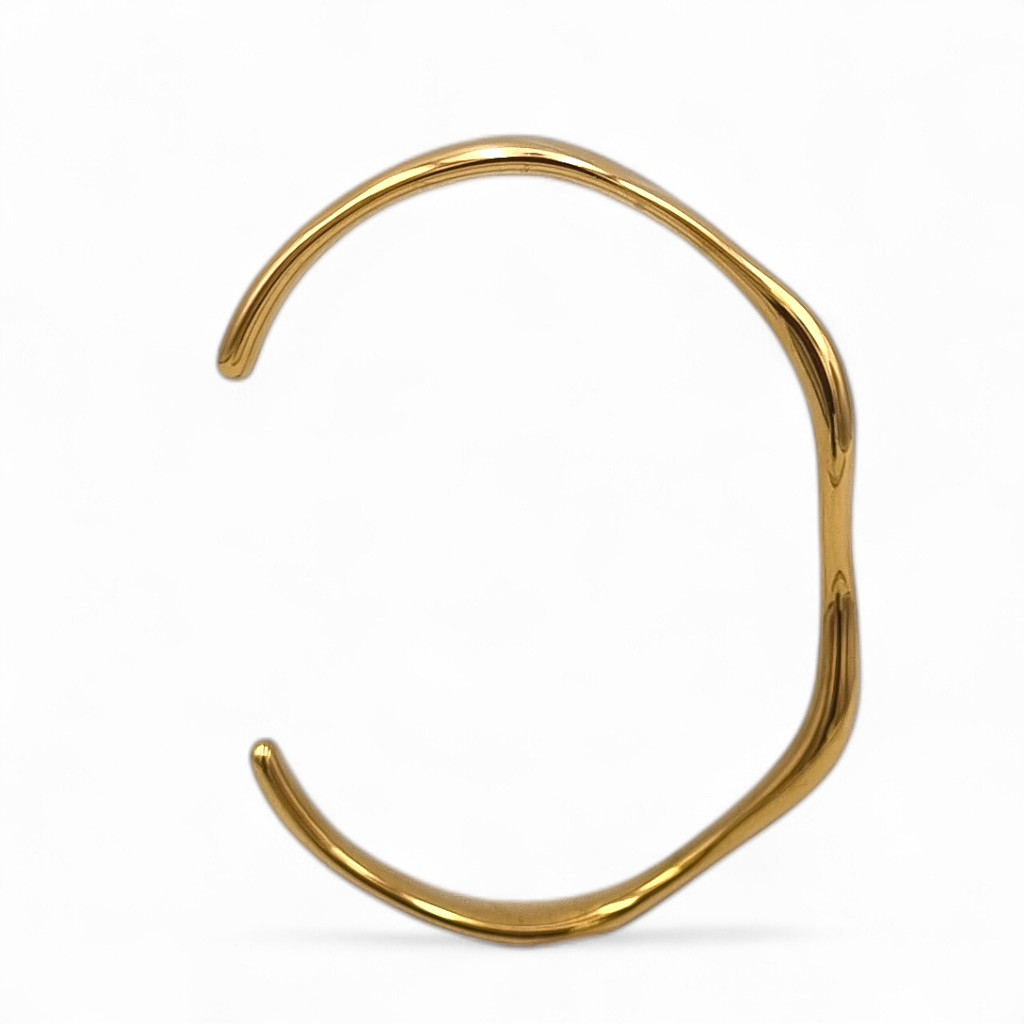 wavy sculptural gold bangle wavy sculptural gold bangle